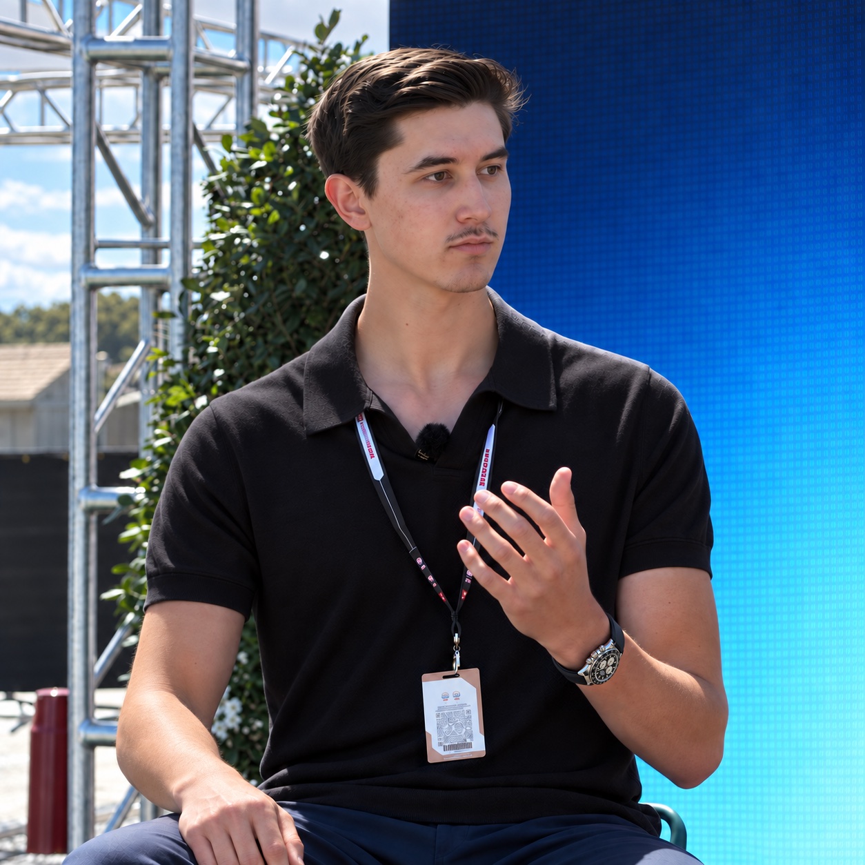 Nick Lambert speaking at a motorsport event